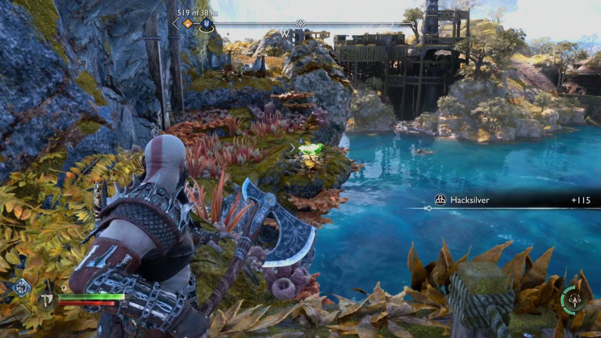 The Bay of Bounty raven is sitting on a grassy verge in God of War Ragnarok.